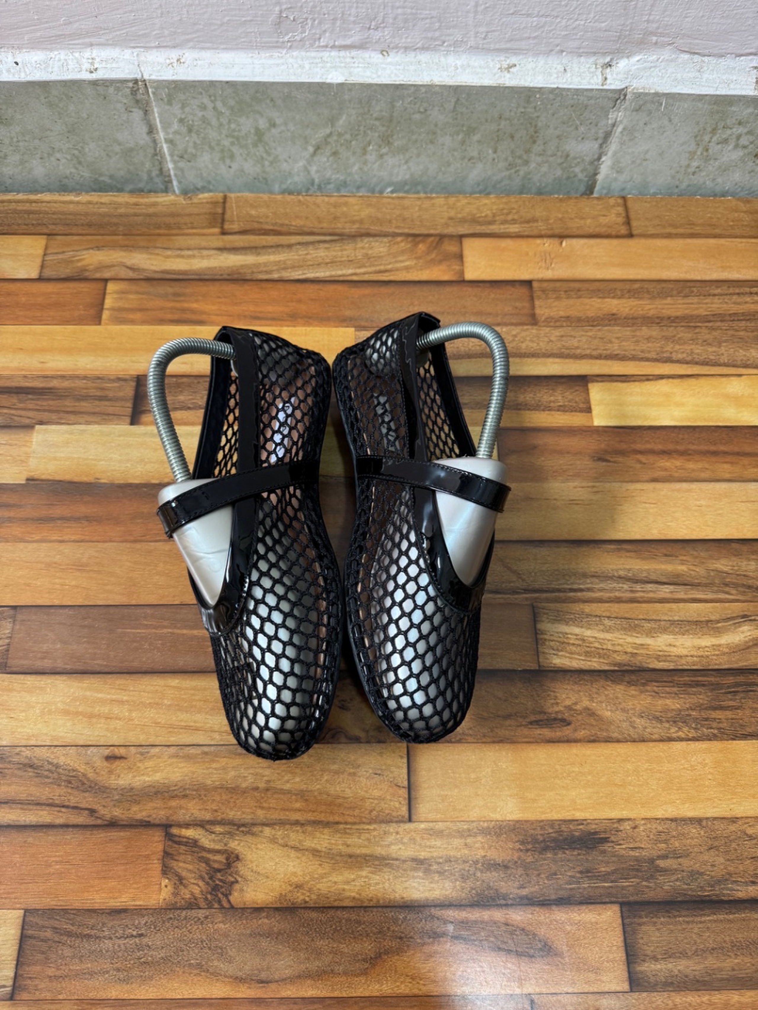ALAIA FISHNET BALLET FLATS