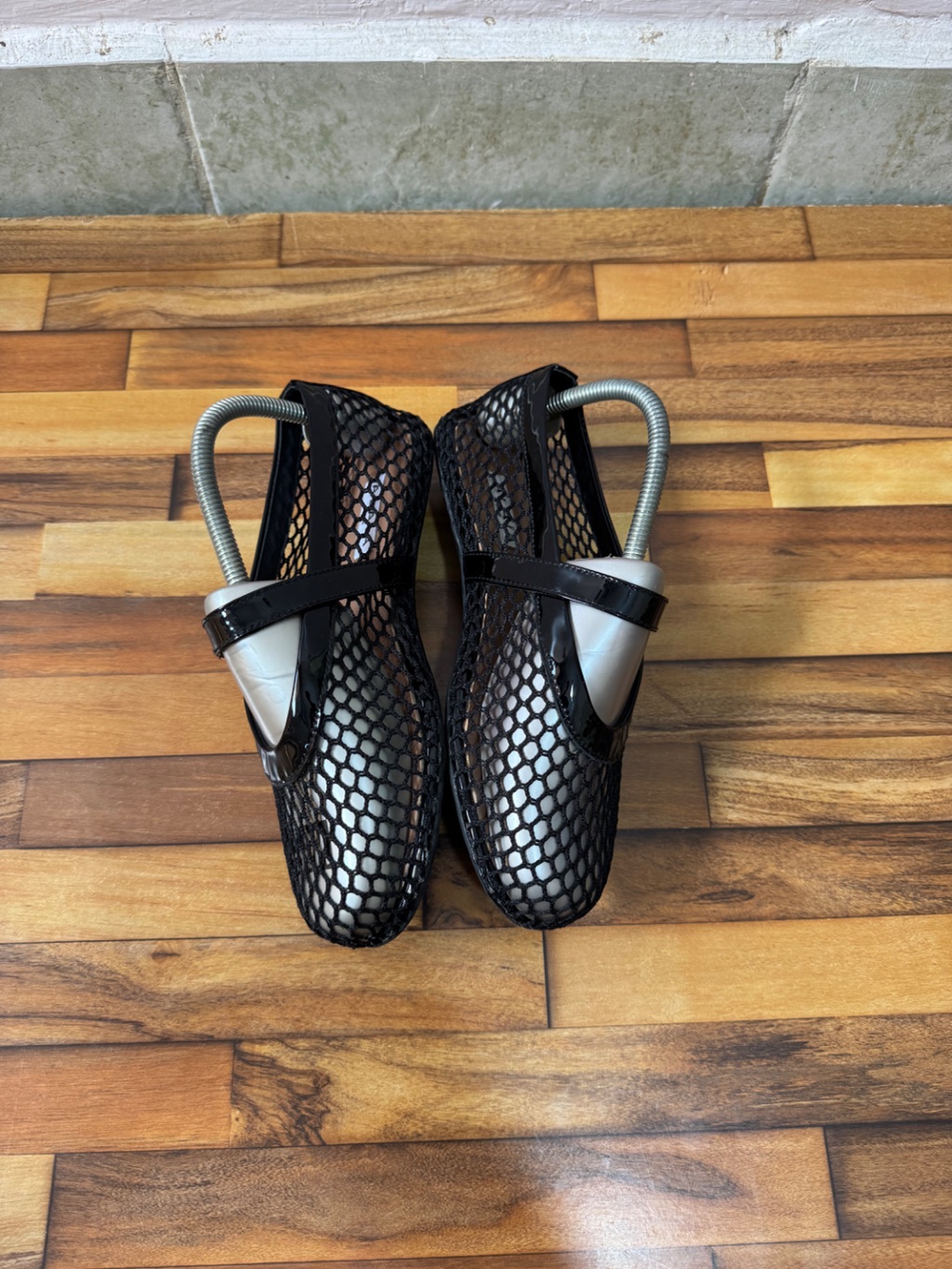 ALAIA FISHNET BALLET FLATS