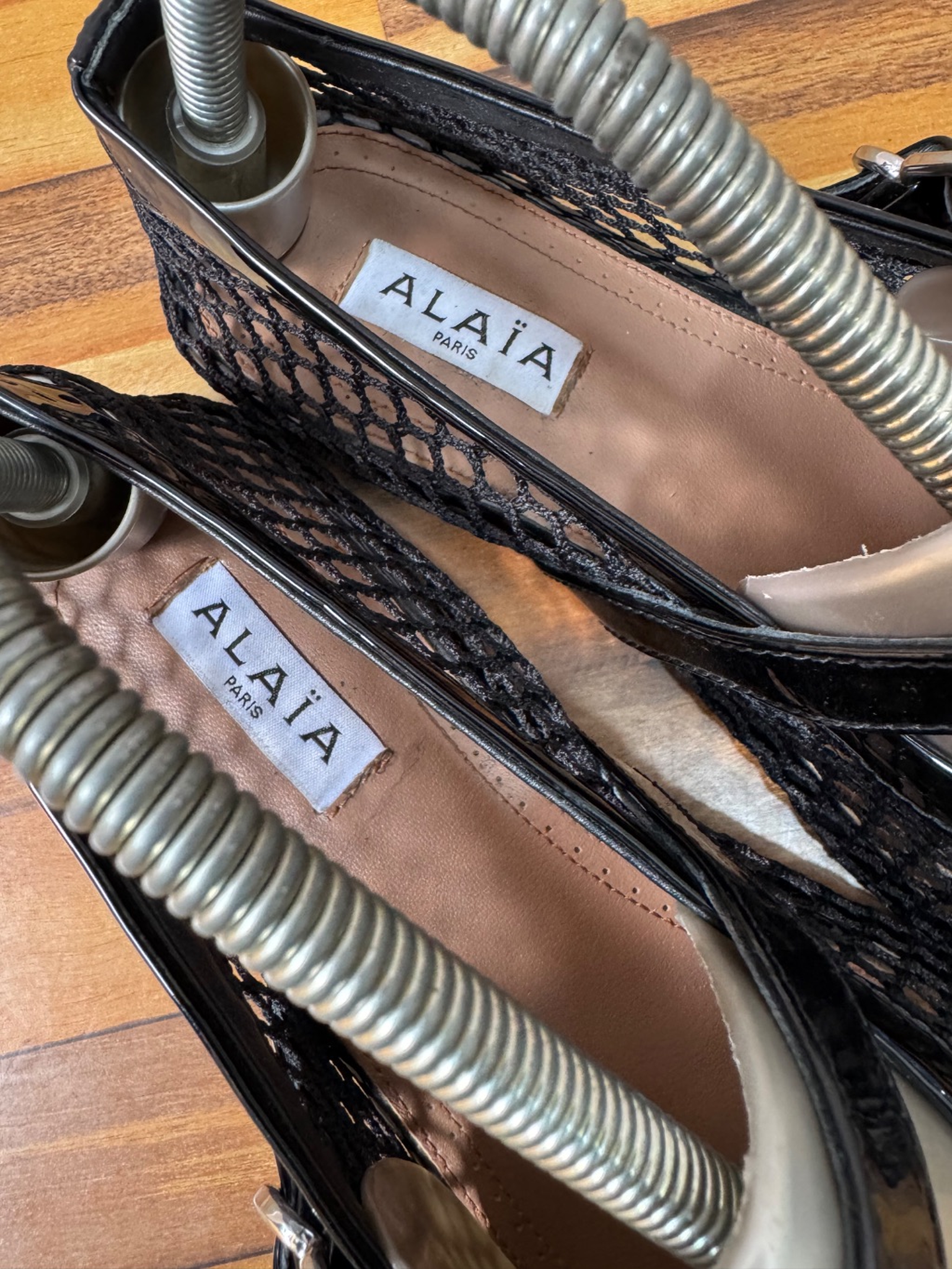 ALAIA FISHNET BALLET FLATS