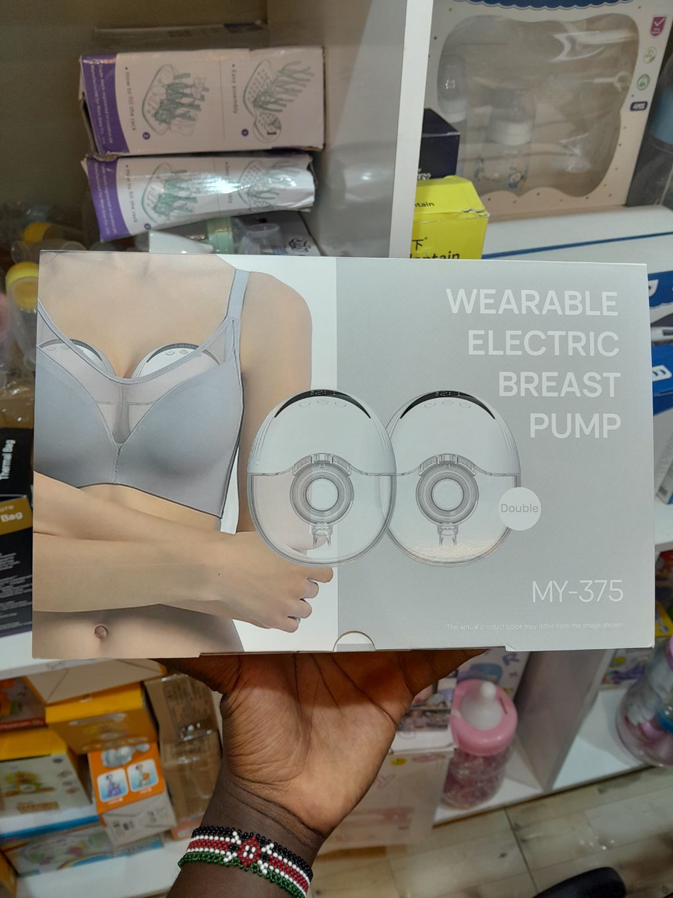 Wearable electric breast pump