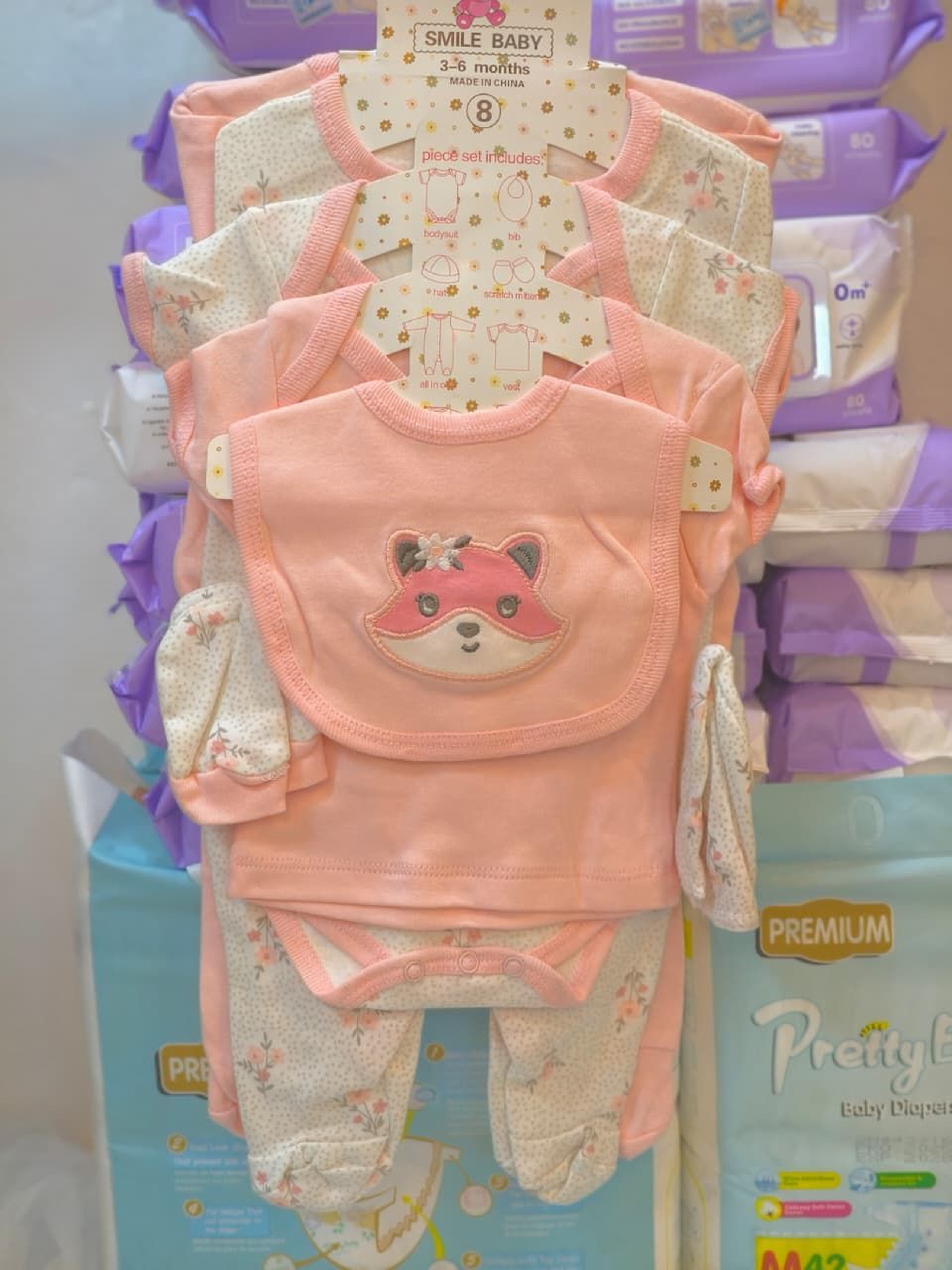 8-Piece Set: Onesie, Hat, Mitts, Bib, & More