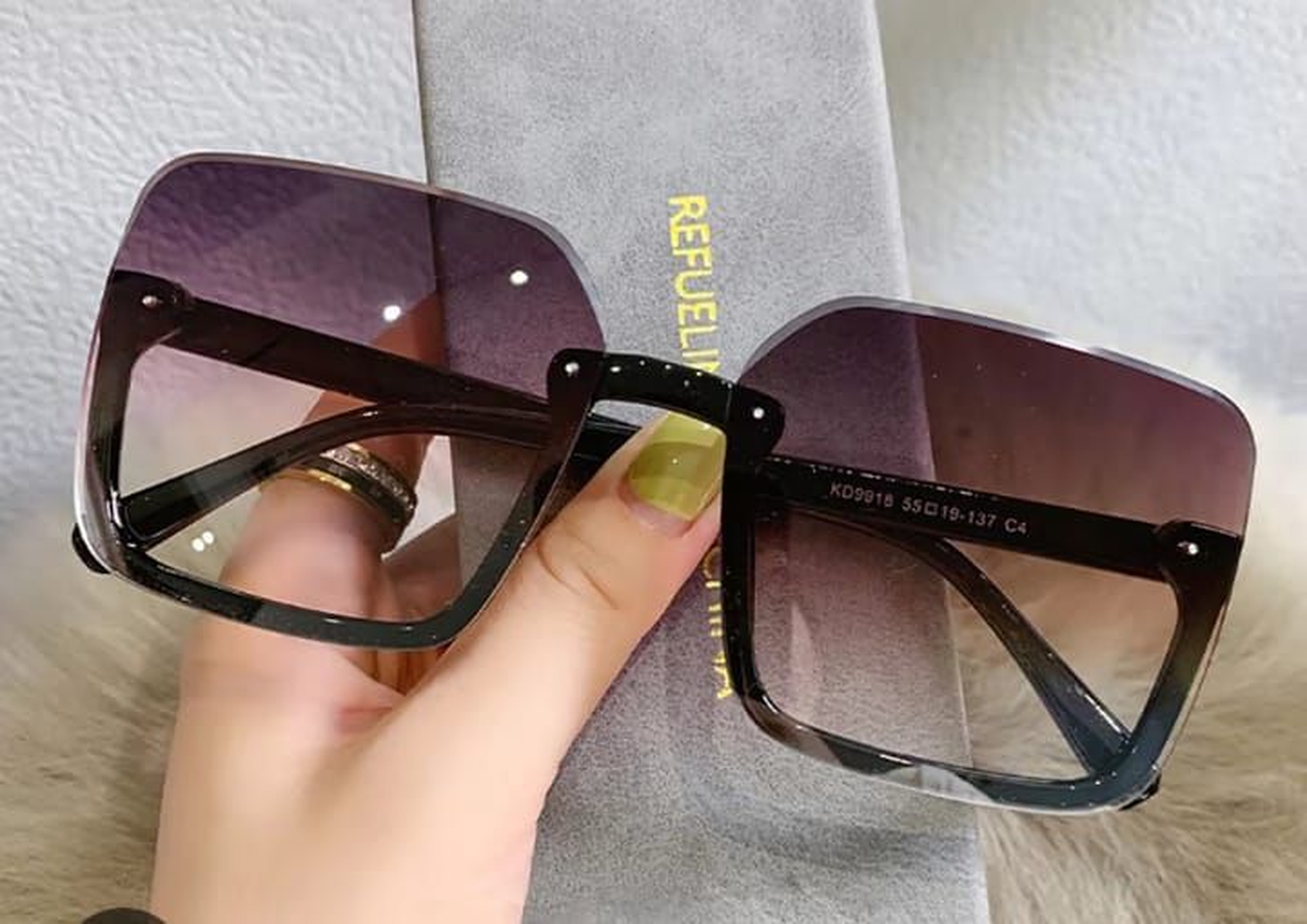 Women rimless , oversized square sunglasses