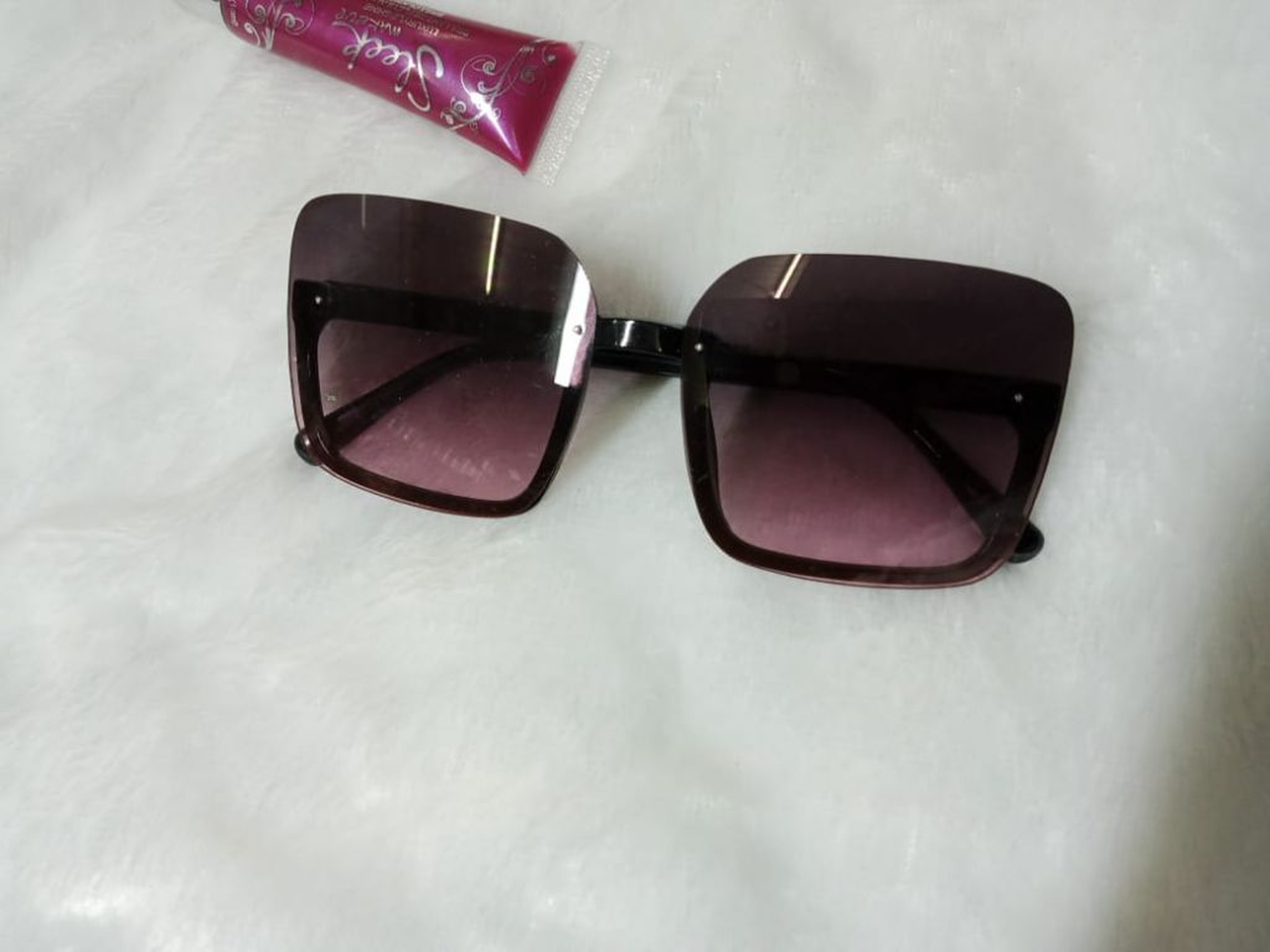 Women rimless , oversized square sunglasses