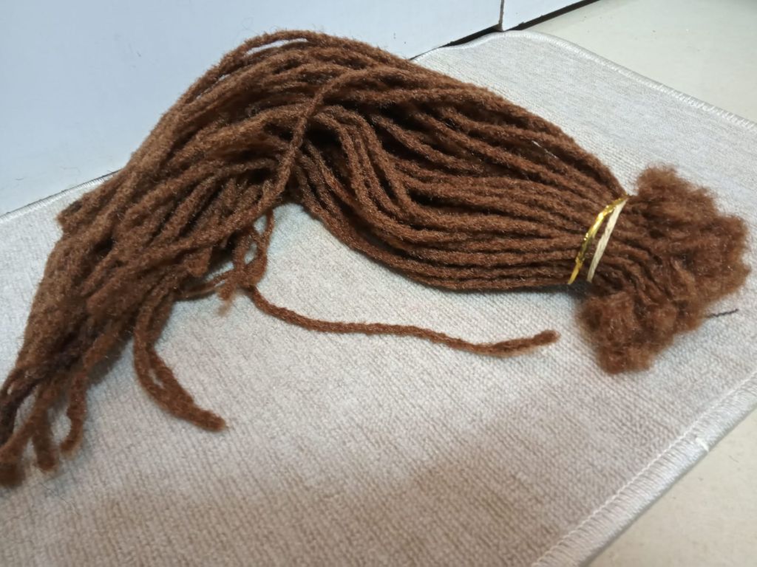 UG/Artificial Locs from 700-2k