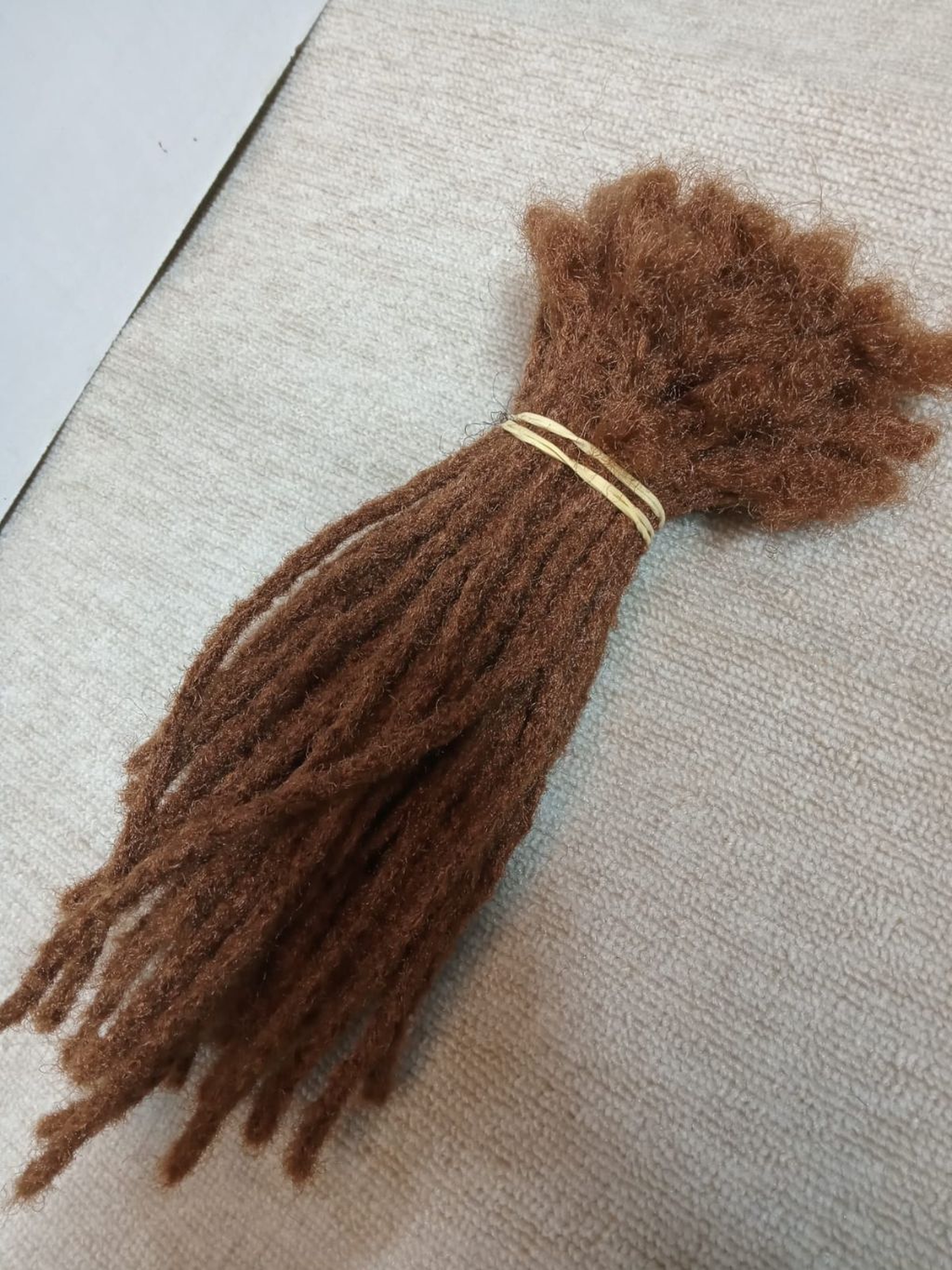 UG/Artificial Locs 700/- to 2k