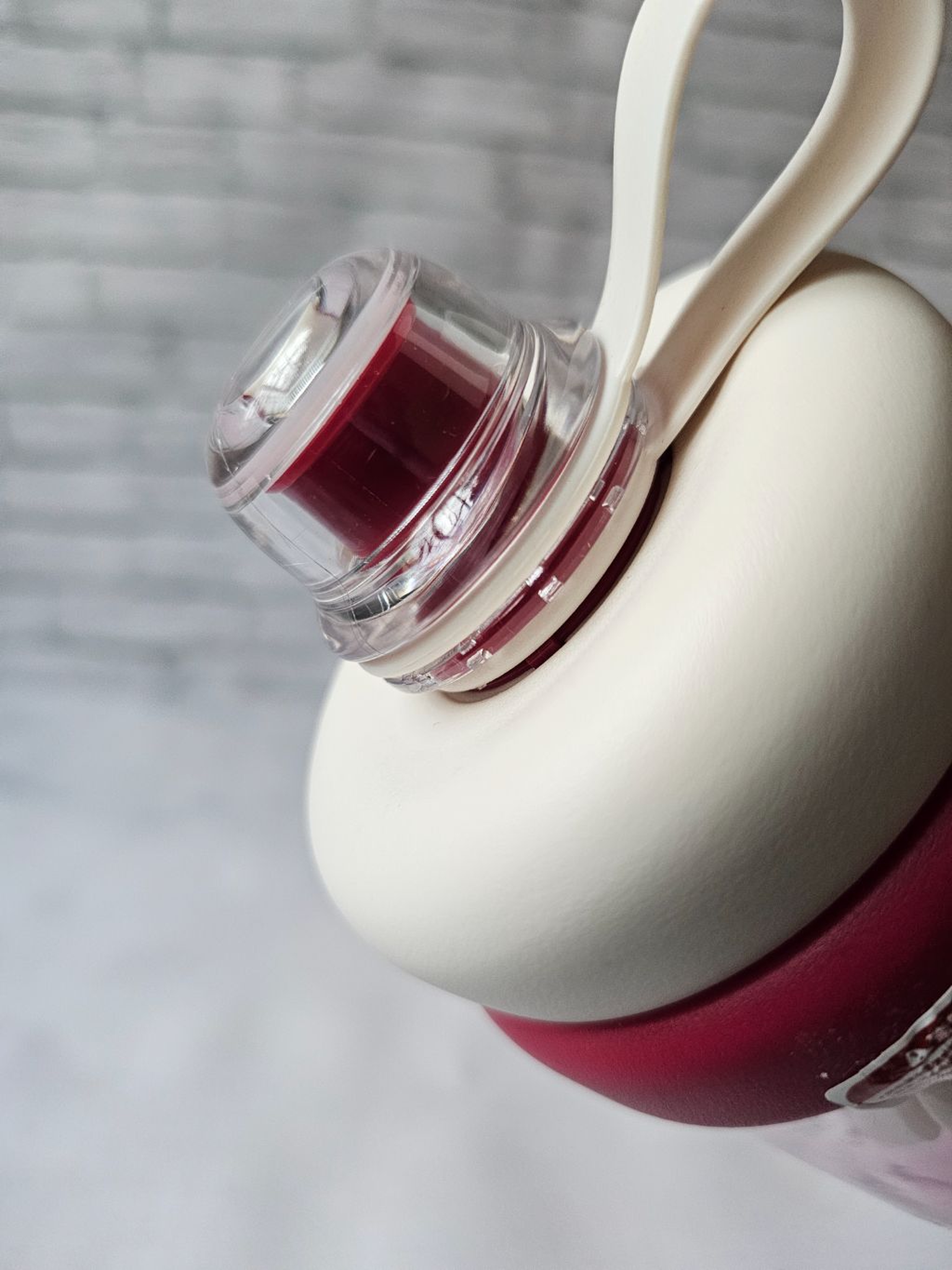 Maroon clear waterbottle 