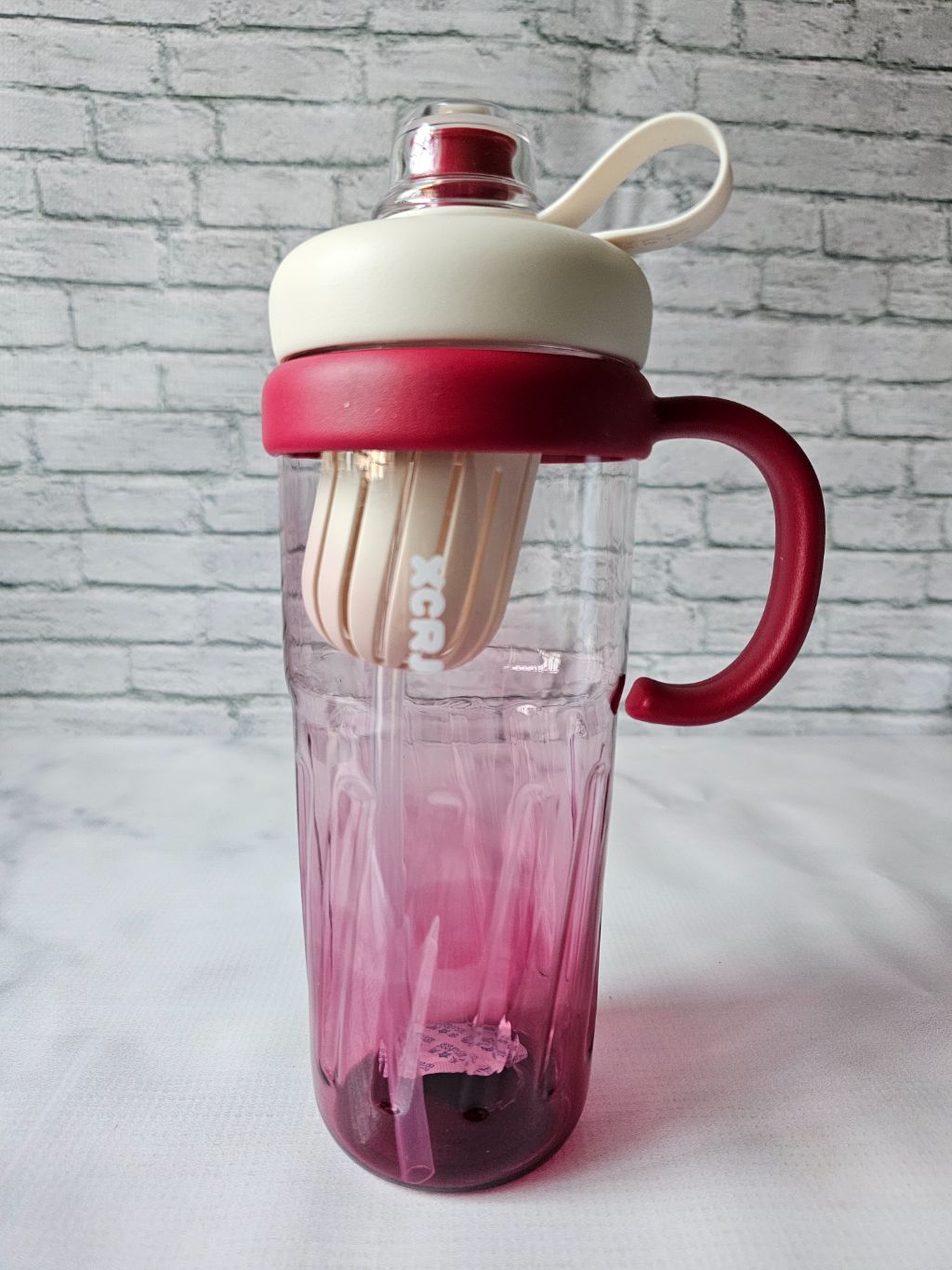 Maroon clear waterbottle 
