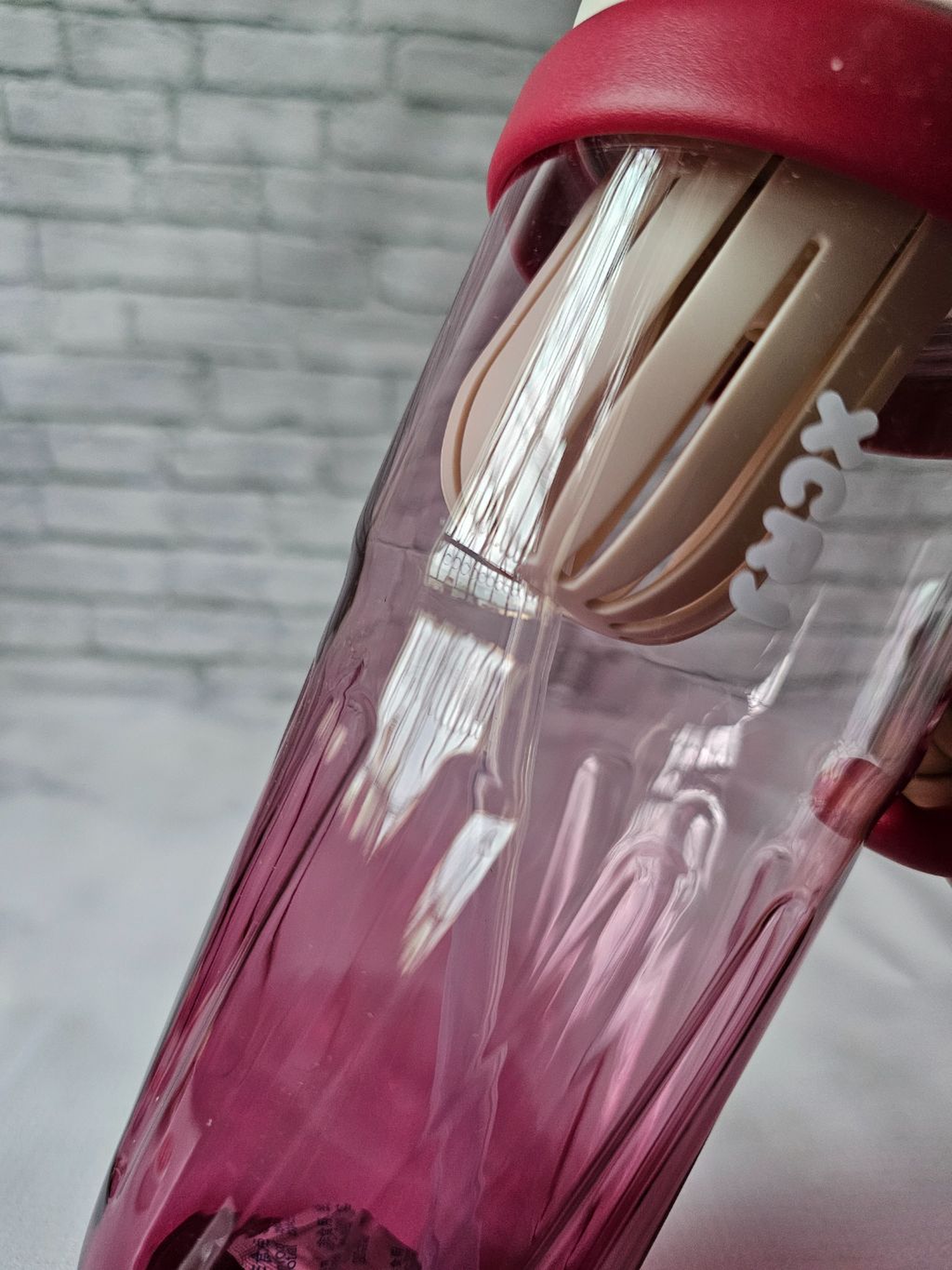 Maroon clear waterbottle 