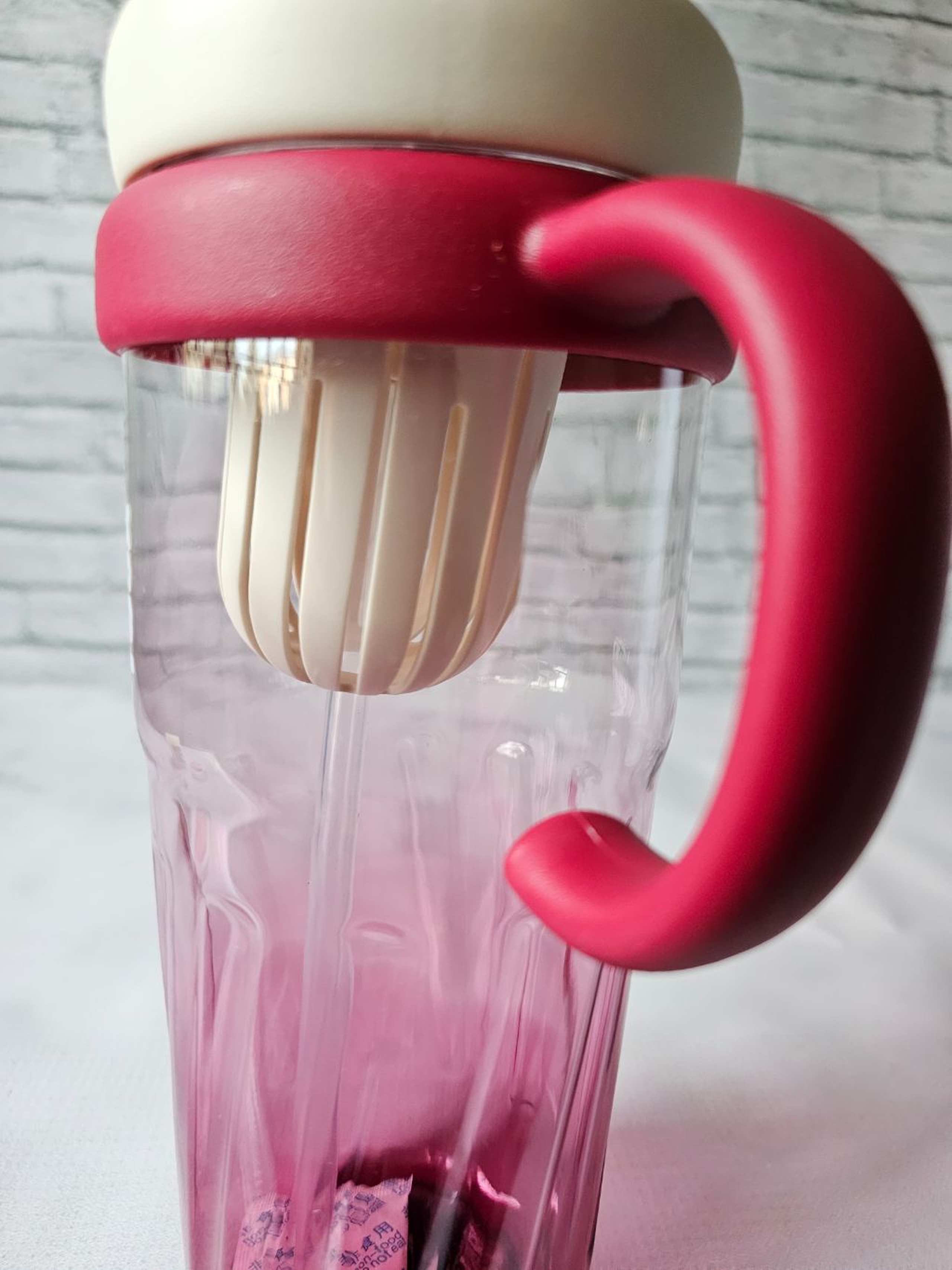 Maroon clear waterbottle 