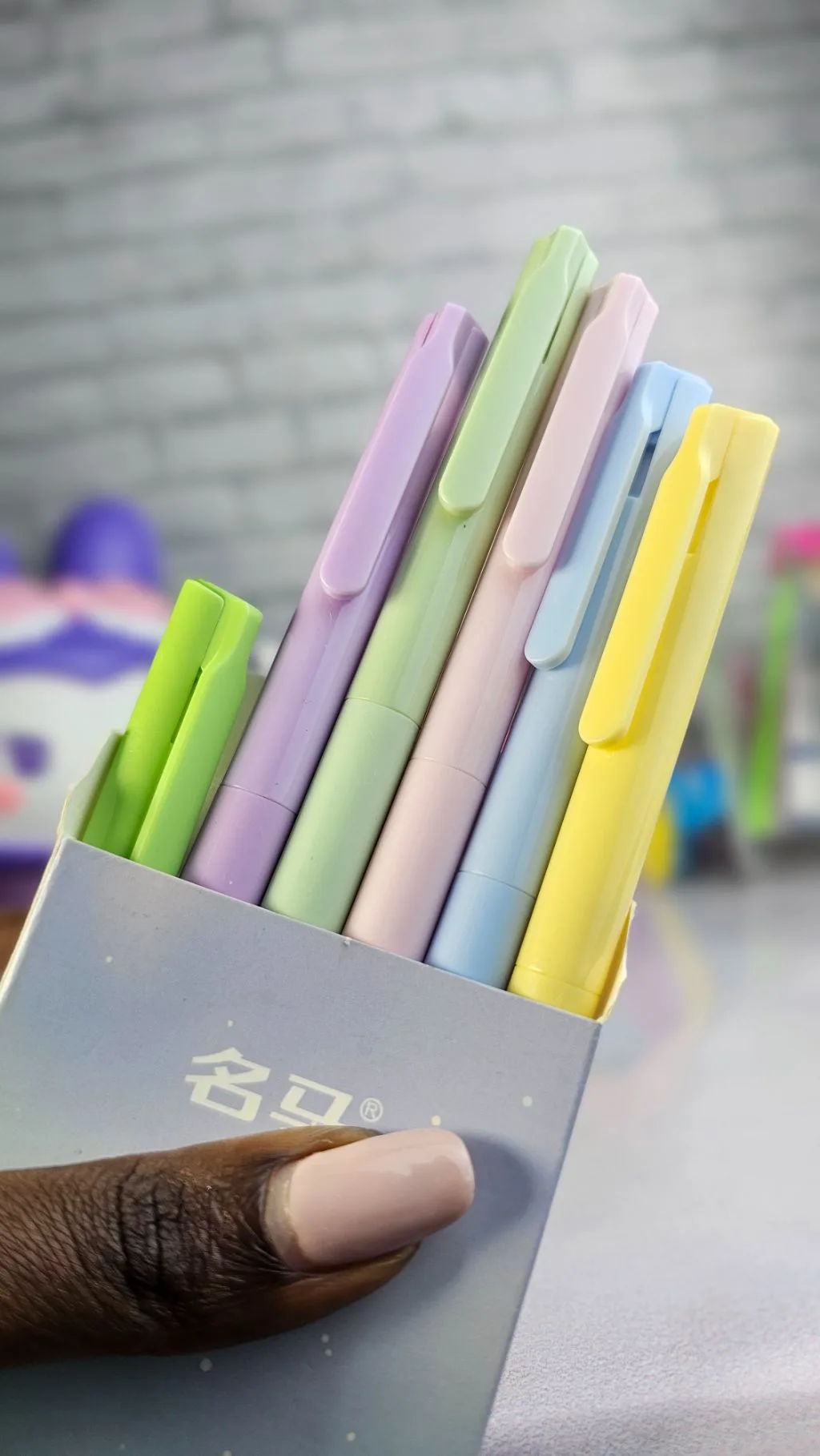 Coloured sharp pointed pens