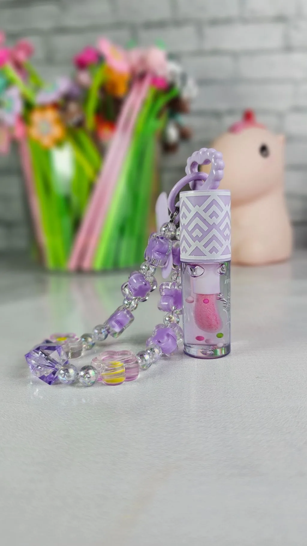 Purple charm colour changing lipgloss