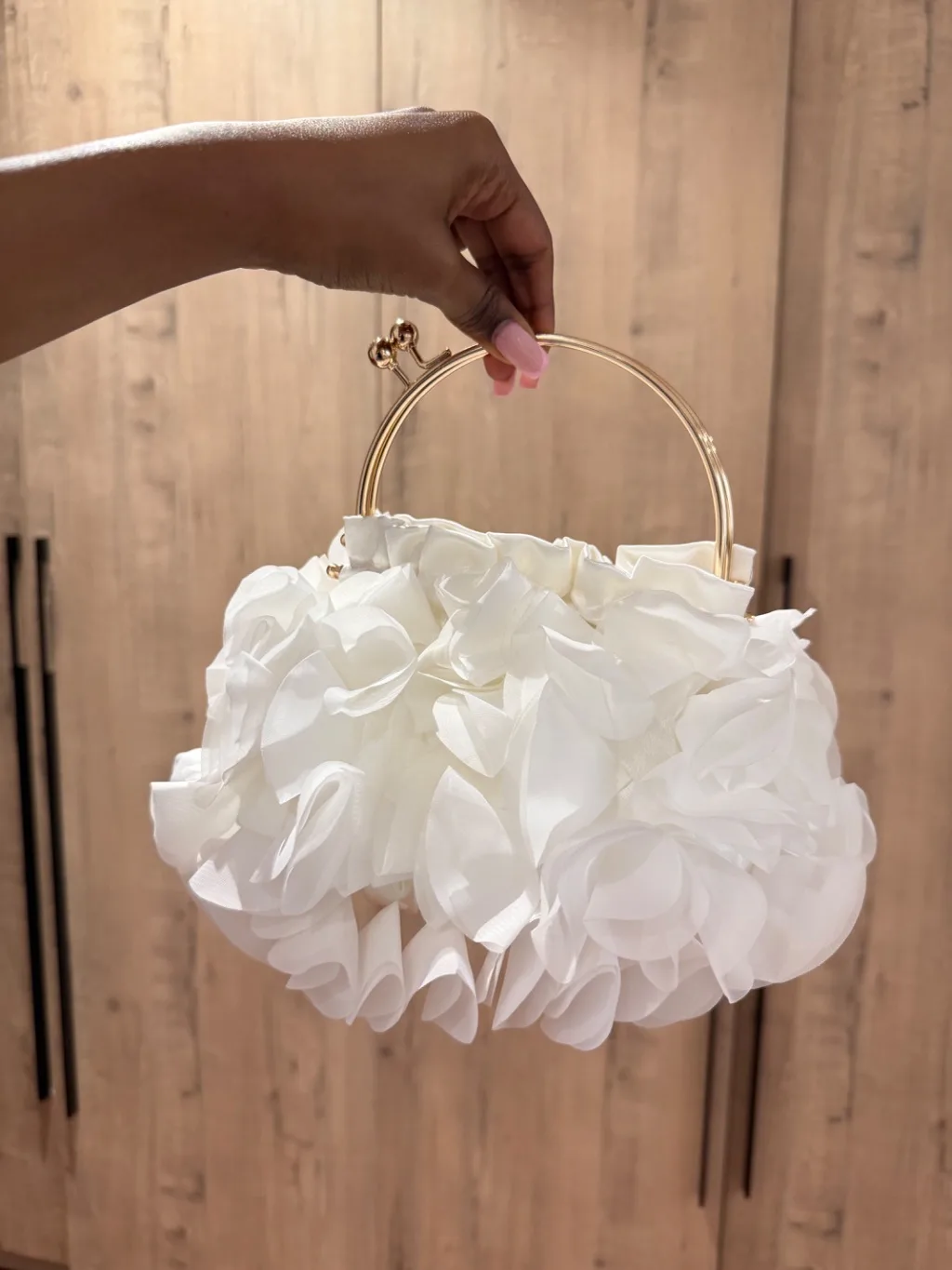 White floral clutch bag