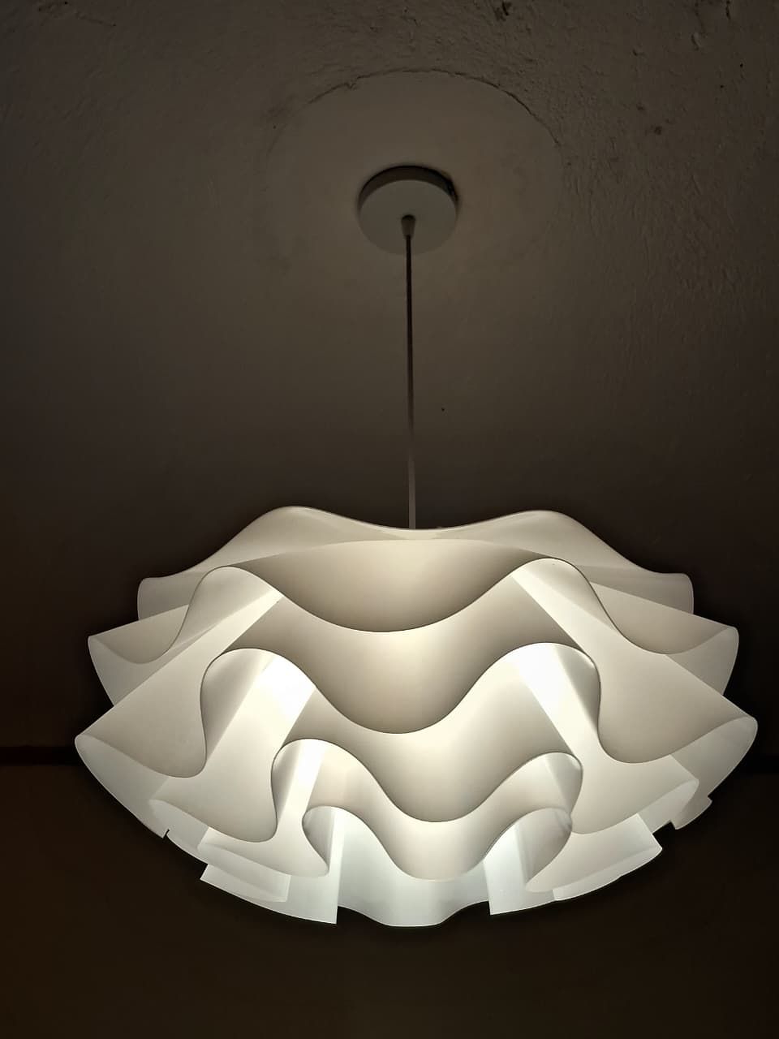 Architectural Tiered Ribbon Pendant Light with Geometric Silhouette