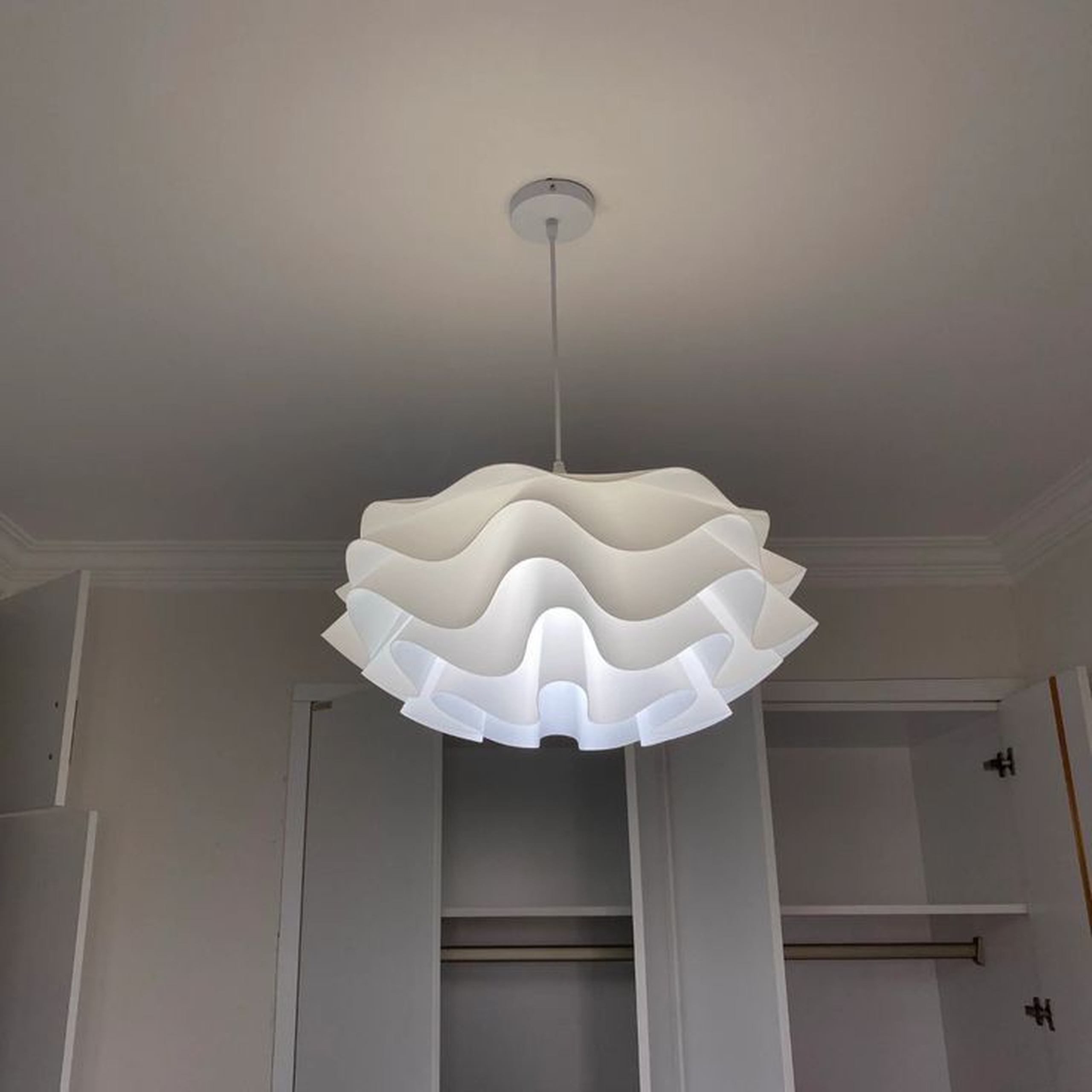 Architectural Tiered Ribbon Pendant Light with Geometric Silhouette