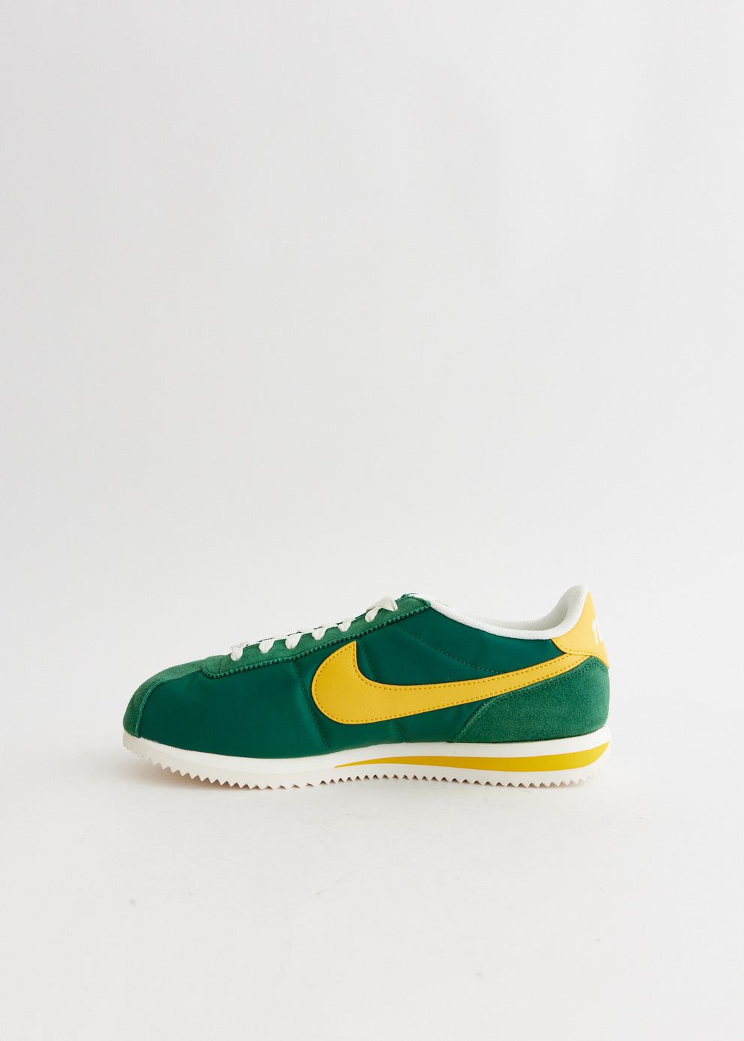 Nike Cortez Textile in the "Oregon" colorway, featuring Gorge Green, Yellow Ochre, and Sail