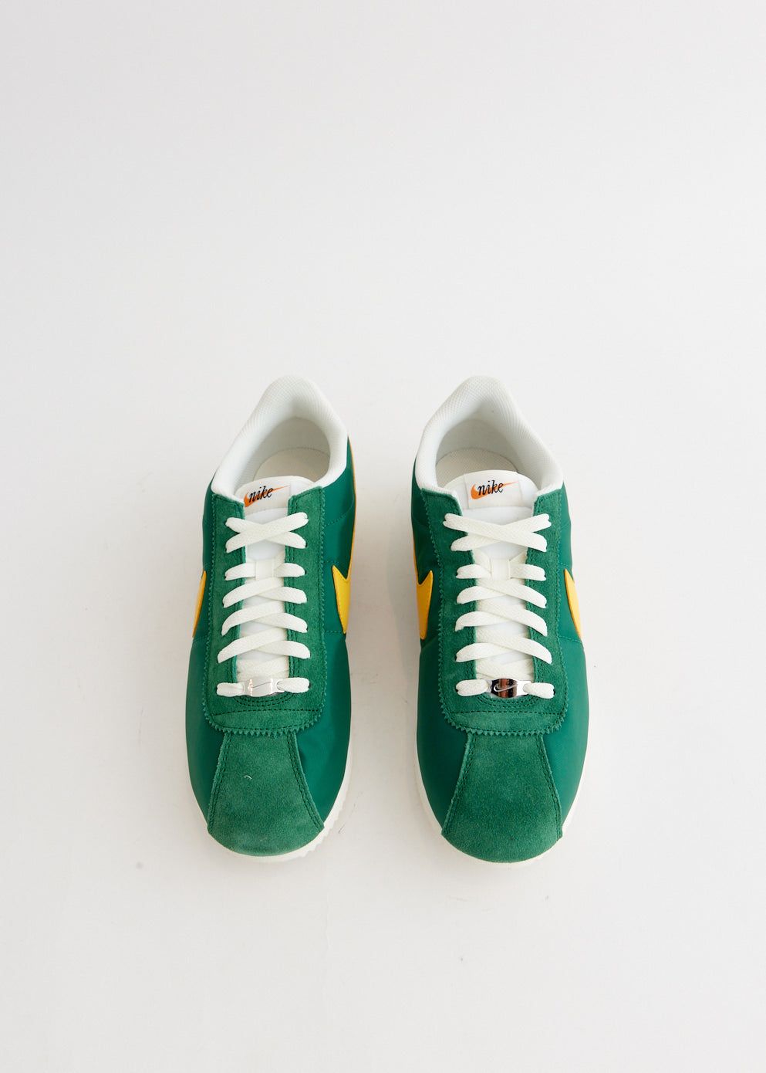 Nike Cortez Textile in the "Oregon" colorway, featuring Gorge Green, Yellow Ochre, and Sail