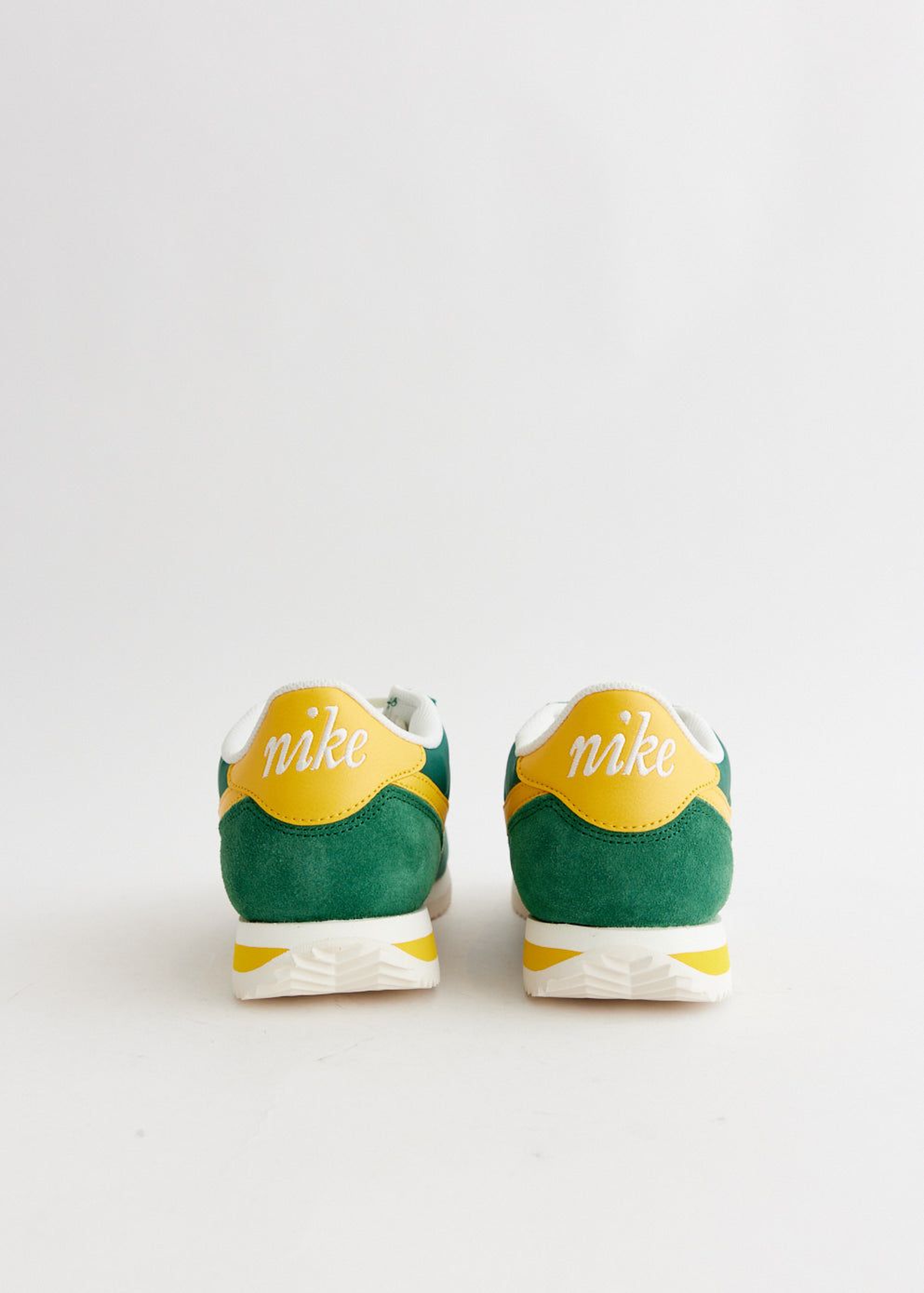 Nike Cortez Textile in the "Oregon" colorway, featuring Gorge Green, Yellow Ochre, and Sail