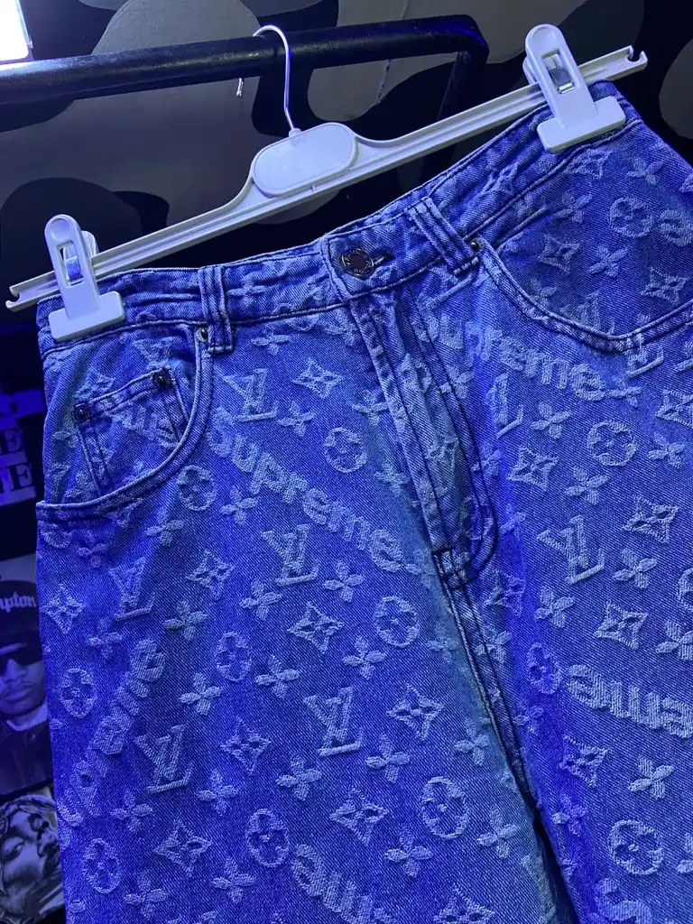 Supreme x LV inspired monogram jeans in light wash denim.