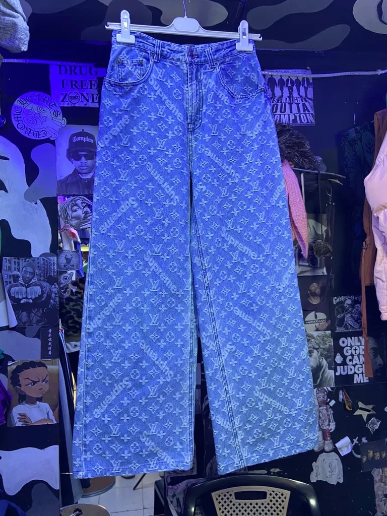 Supreme x LV inspired monogram jeans in light wash denim.