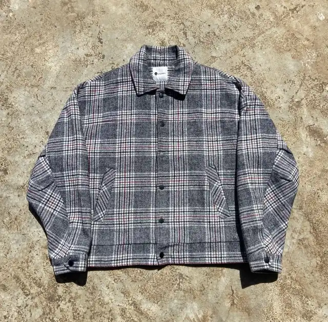 Grey plaid wool-blend work jacket with large back embroidery.