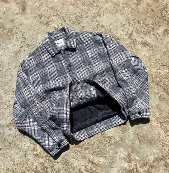 Grey plaid wool-blend work jacket with large back embroidery.