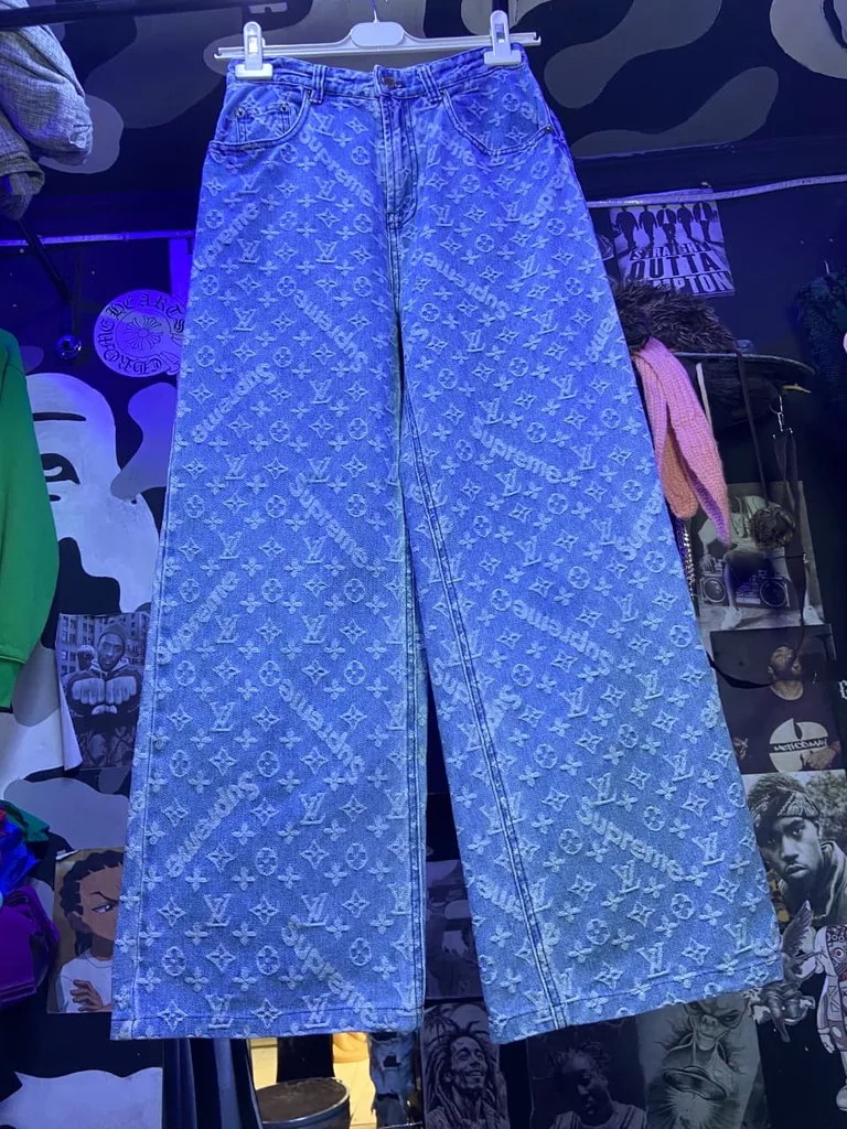 Supreme x LV inspired monogram jeans in light wash denim.