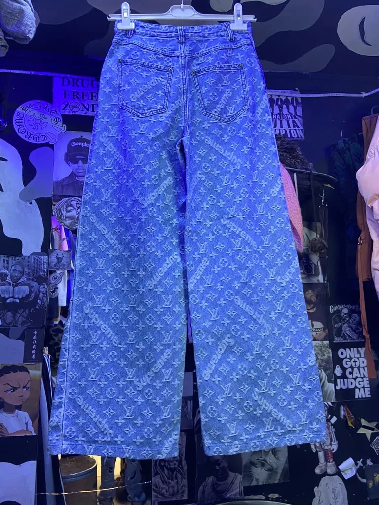 Supreme x LV inspired monogram jeans in light wash denim.
