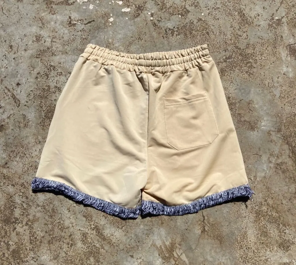 Hellstar-inspired graphic mesh shorts in white with black,white,cream