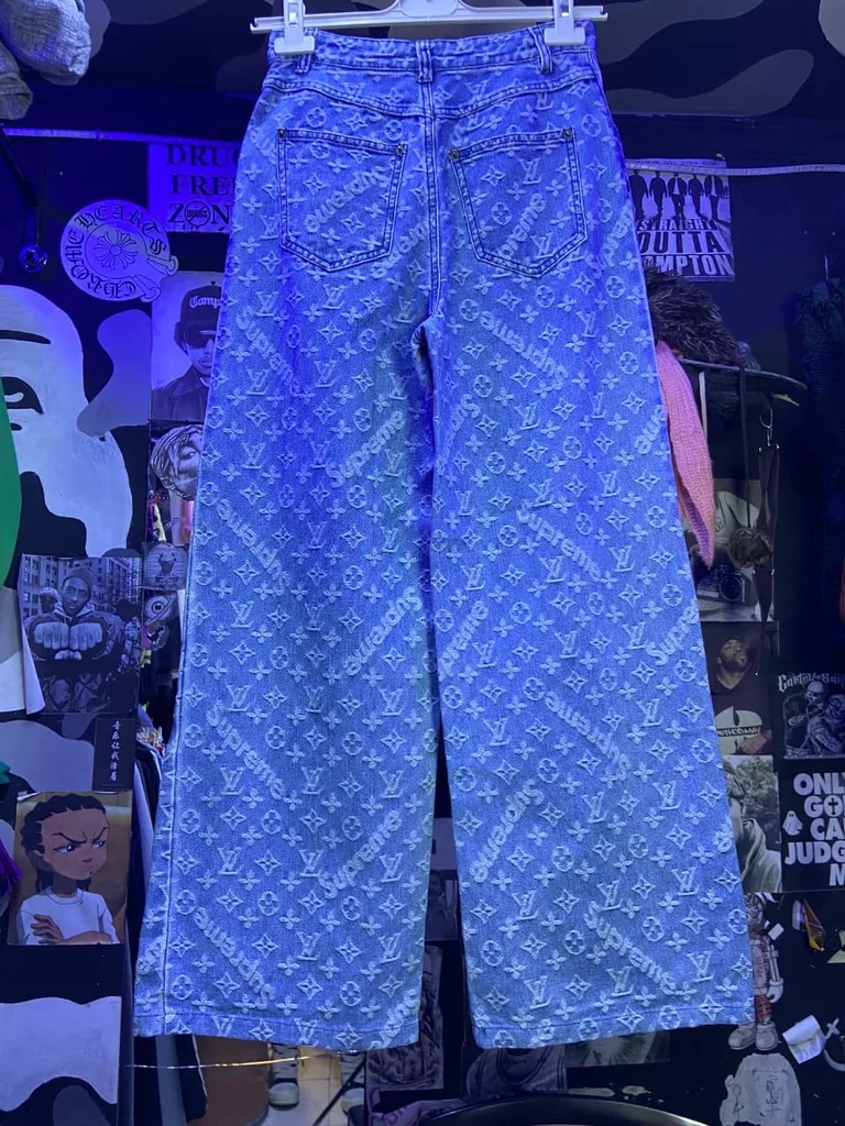 Supreme x LV inspired monogram jeans in light wash denim.