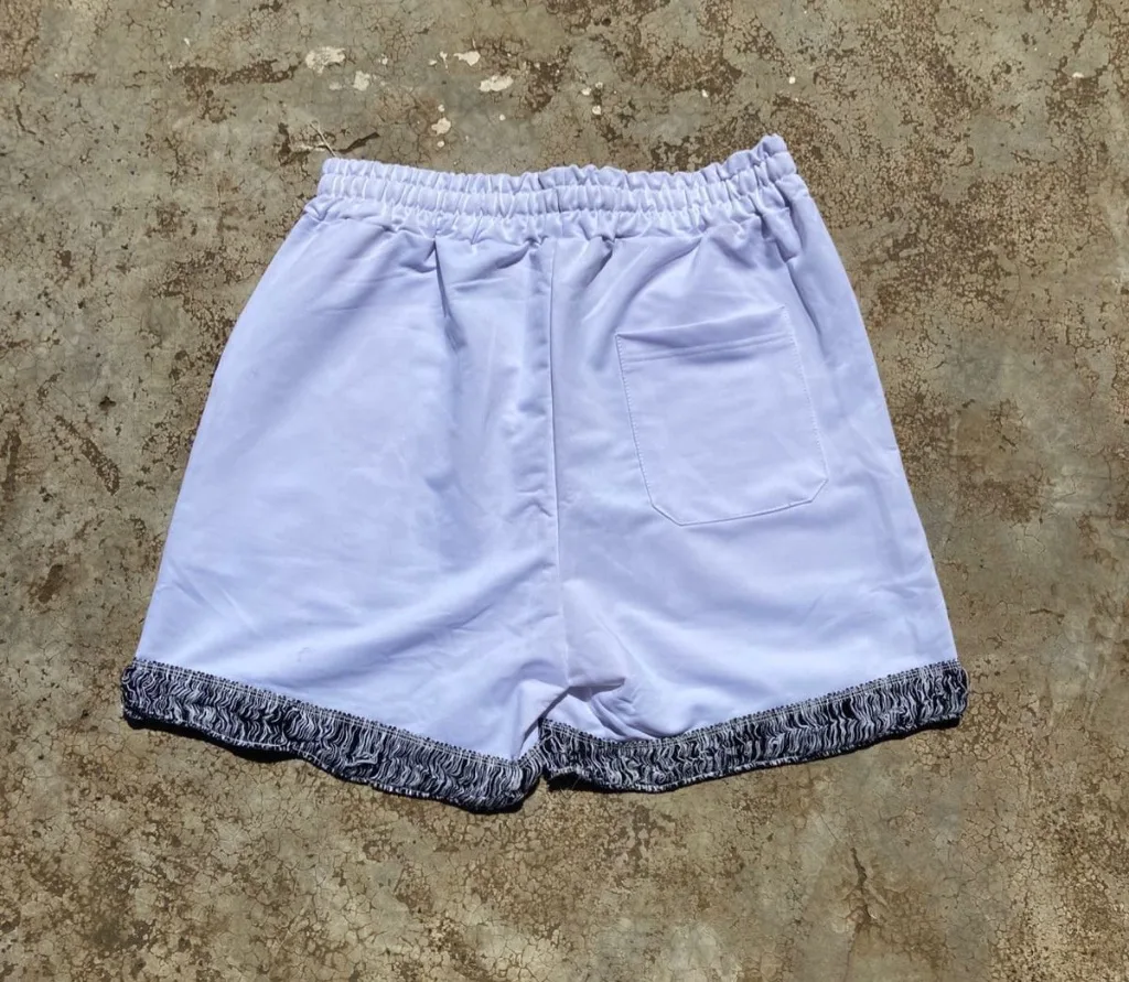 Hellstar-inspired graphic mesh shorts in white with black,white,cream