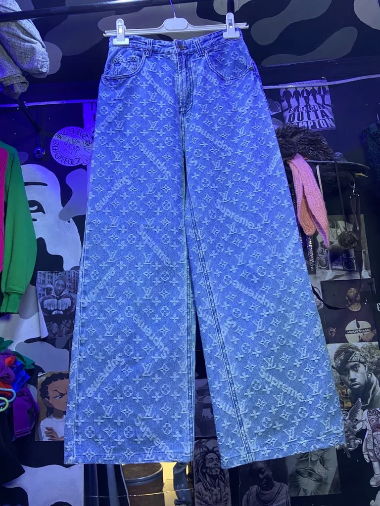 Supreme x LV inspired monogram jeans in light wash denim.
