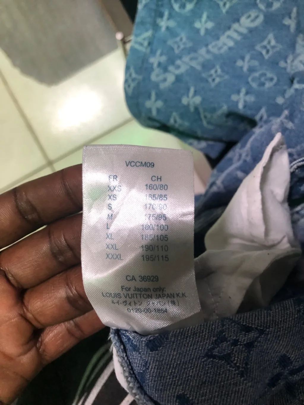 Supreme x LV inspired monogram jeans in light wash denim.