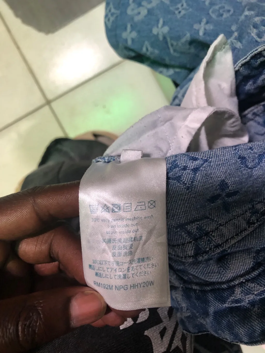 Supreme x LV inspired monogram jeans in light wash denim.