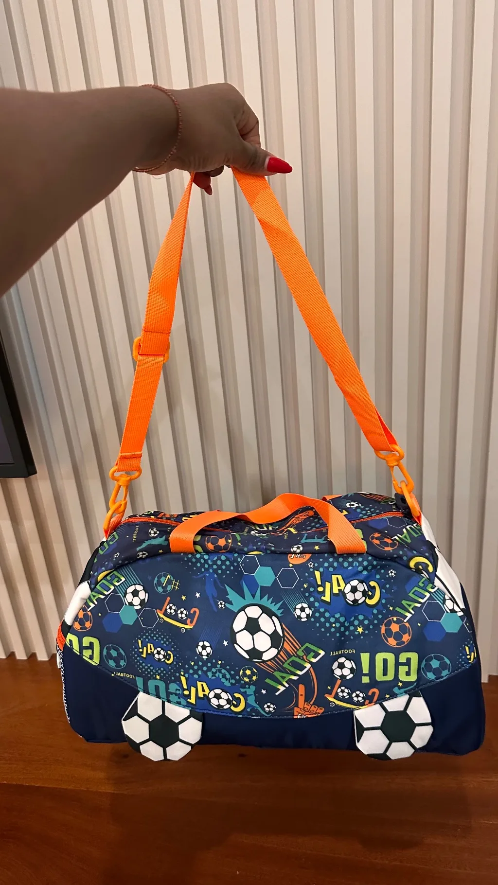 football themed duffle bag (orange straps)