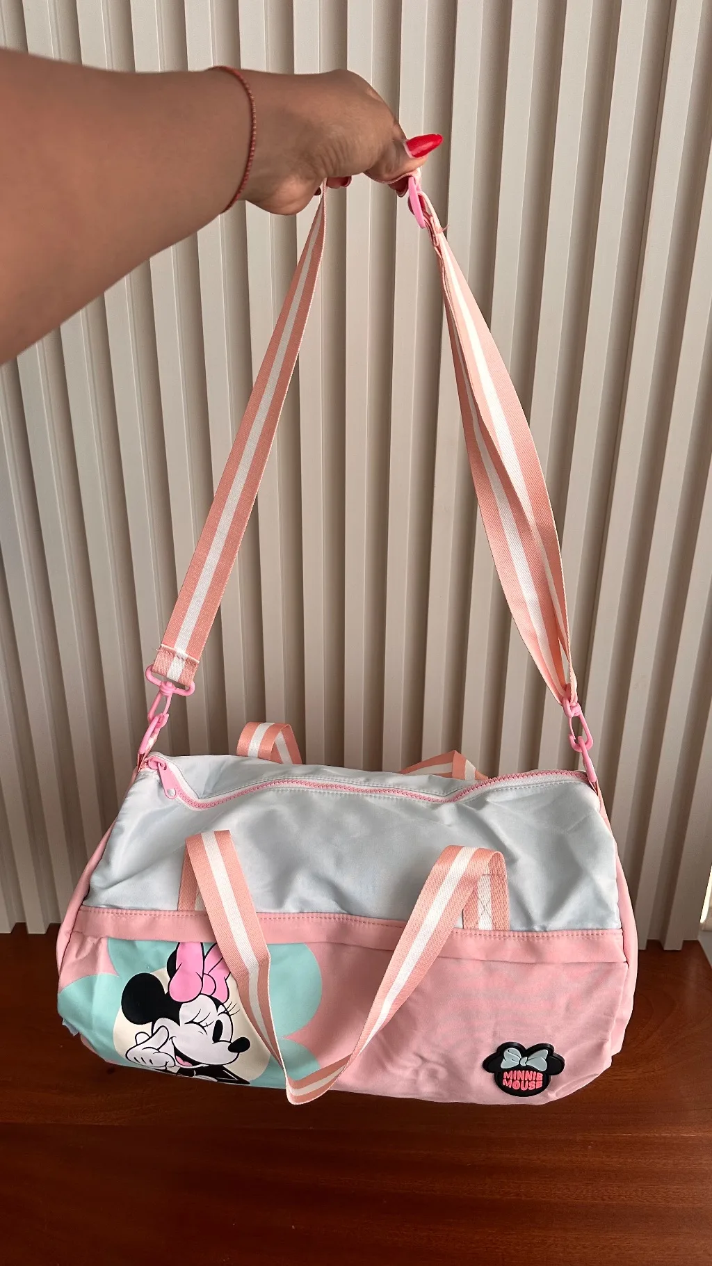 This pastel pink and light blue Minnie Mouse Disney duffle