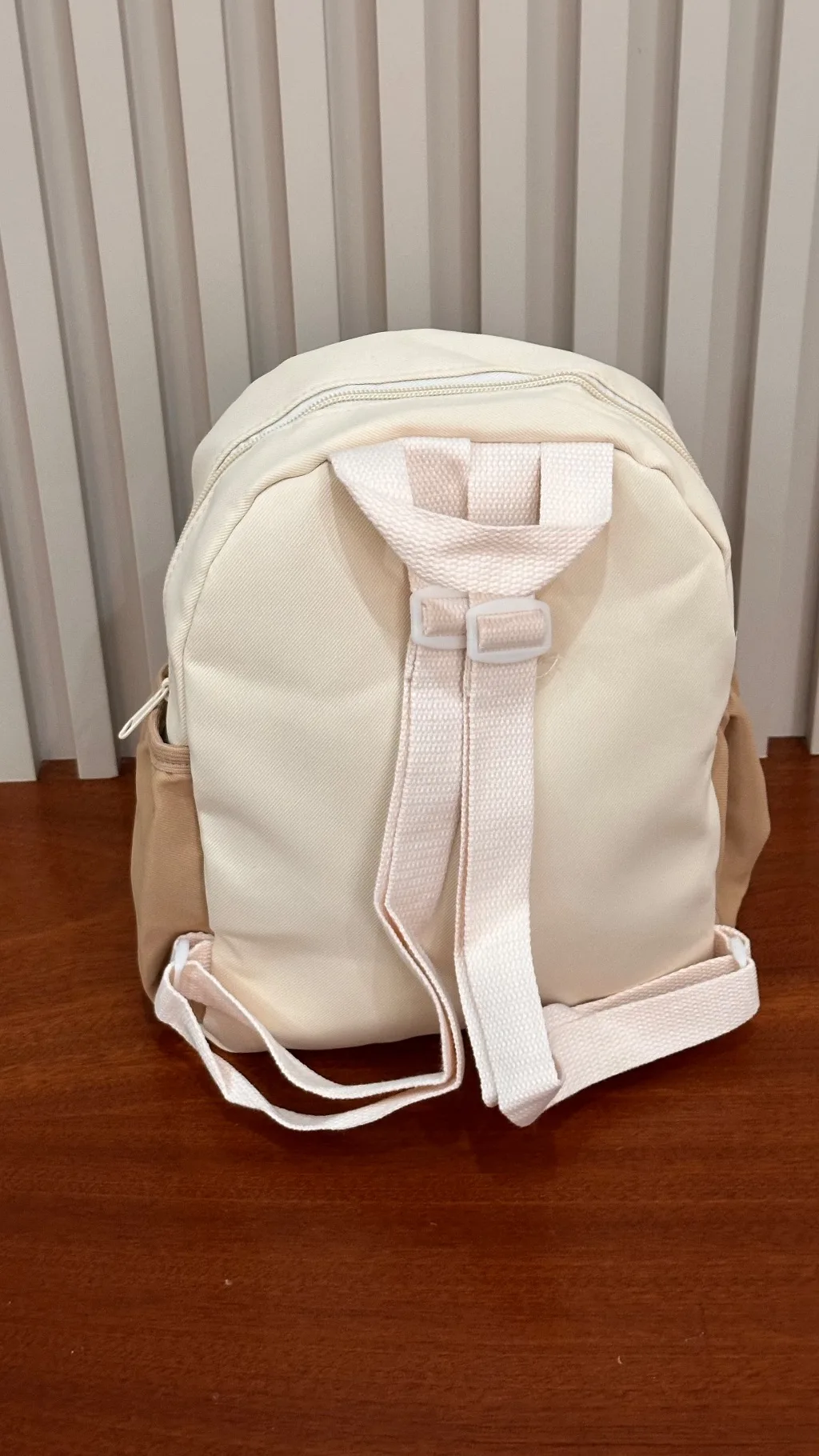 beige canvas Dino  children's backpack