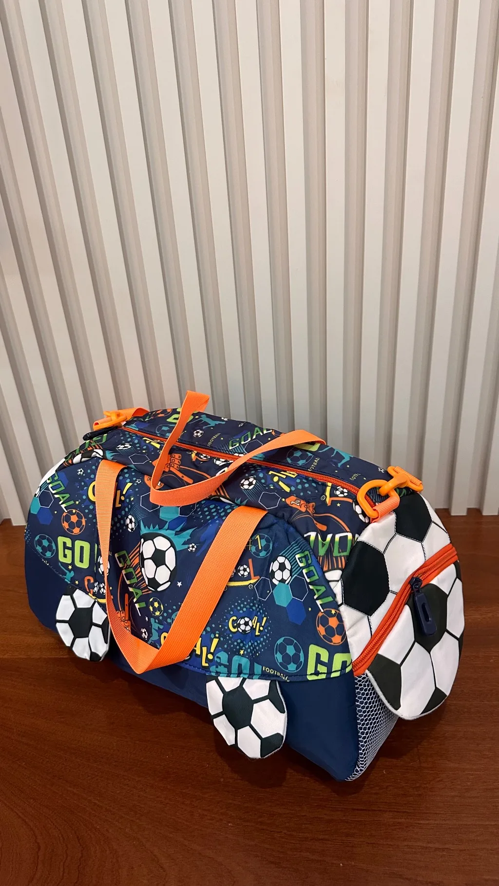 football themed duffle bag (orange straps)