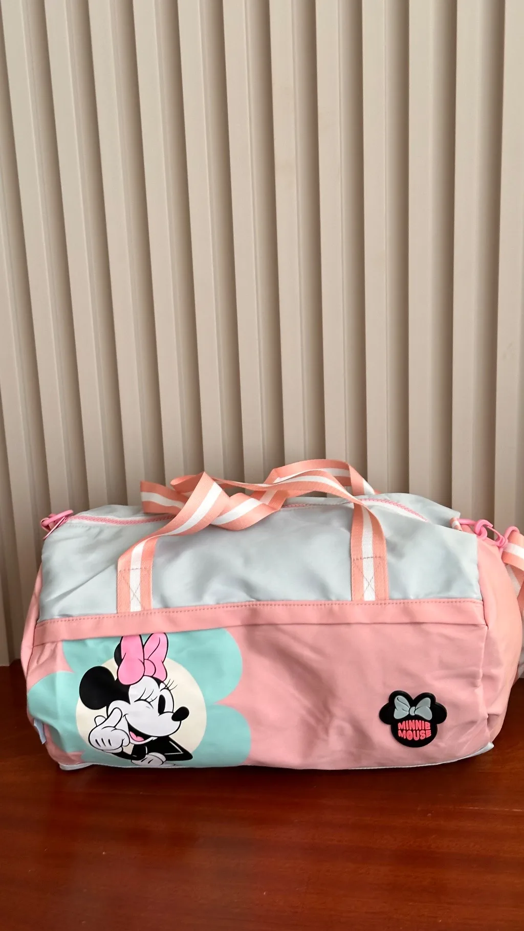 This pastel pink and light blue Minnie Mouse Disney duffle